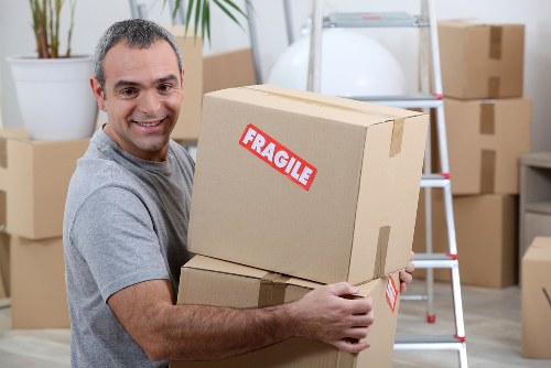 Moving van and packed boxes for local removals in Battersea