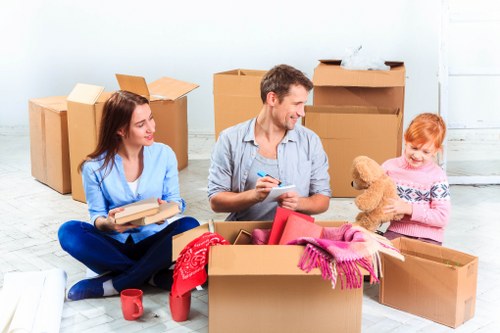 Professional house removals team working in Battersea street