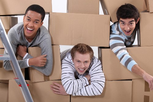 Office relocation planning in Battersea with moving boxes and desks