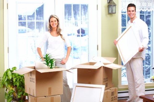 Professional movers loading furniture for a Battersea relocation