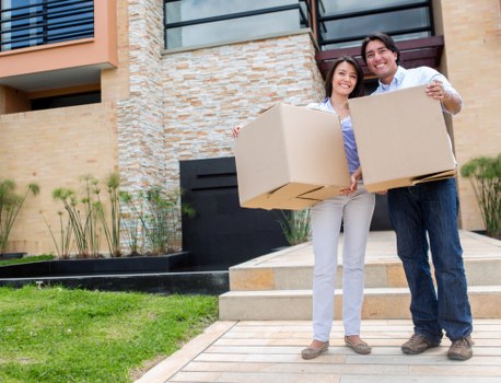 Professional movers loading furniture in Battersea