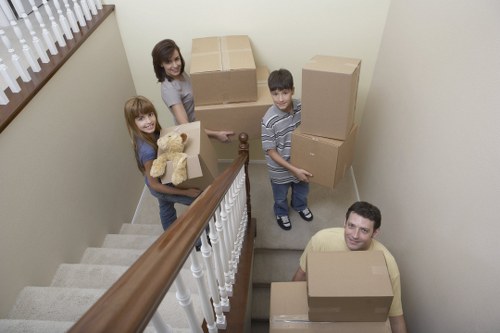 Careful packing of fragile household items in Battersea
